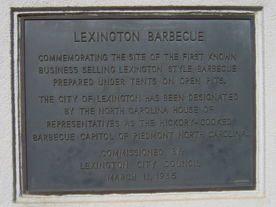 Bronze plaque in Lexington marking the site of the first known business selling Lexington-style barbecue